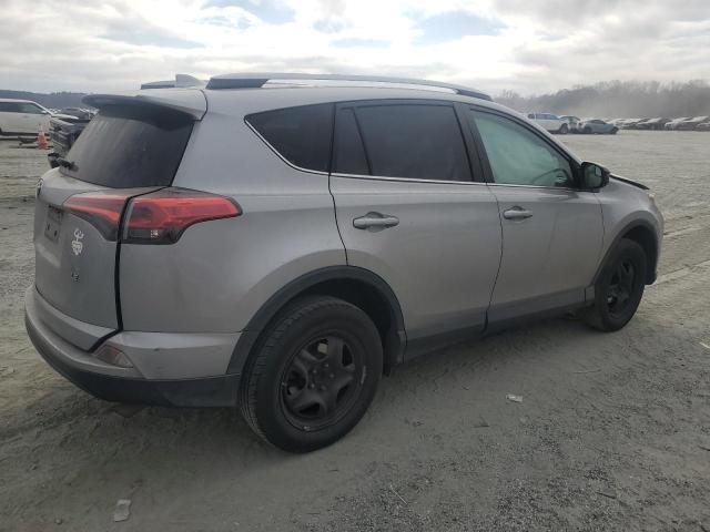 Photo 3 from auction – 2018 TOYOTA RAV4 LE with VIN 2T3ZFREV6JW521834