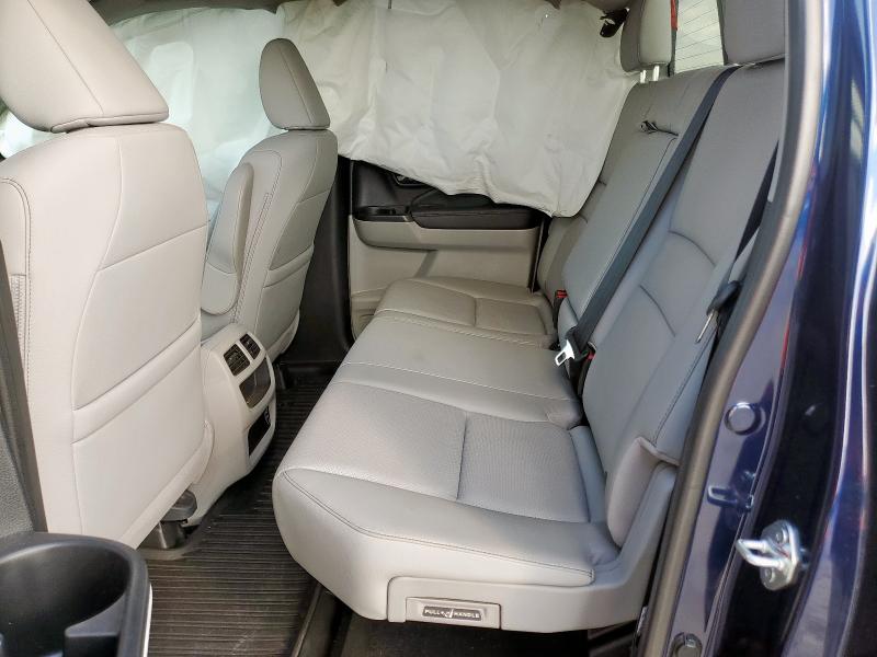 Photo 11 from auction – 2023 HONDA RIDGELINE with VIN 5FPYK3F79PB025744