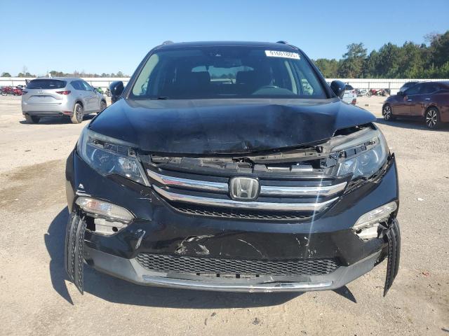 Photo 5 from auction – 2017 HONDA PILOT ELIT with VIN 5FNYF6H07HB075560
