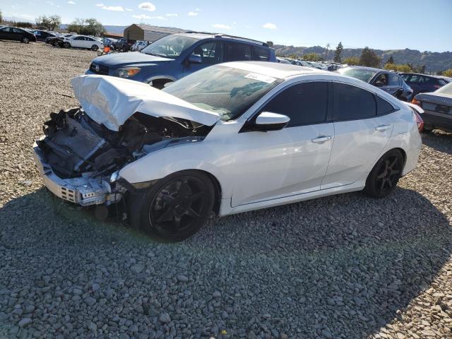 HONDA CIVIC SI 2018 with VIN 2HGFC1E57JH704304 - Photo from auction