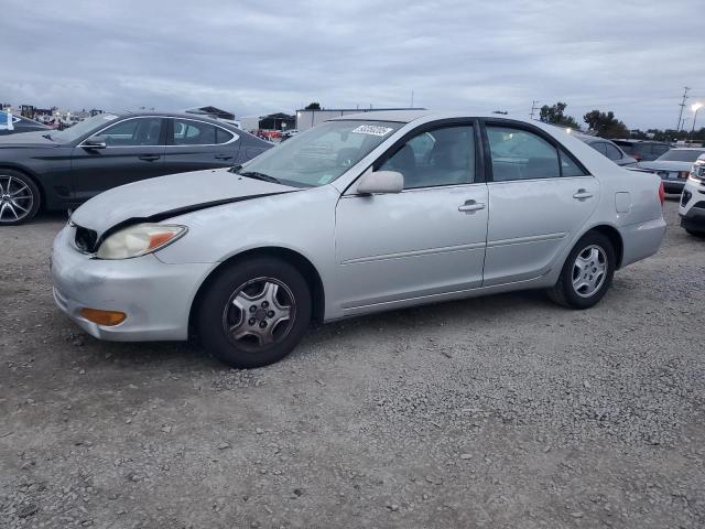 TOYOTA CAMRY LE 2002 with VIN 4T1BF32K82U540940 - Photo from auction