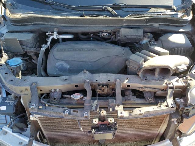 Photo 11 from auction – 2021 HONDA PASSPORT S with VIN 5FNYF8H26MB024476
