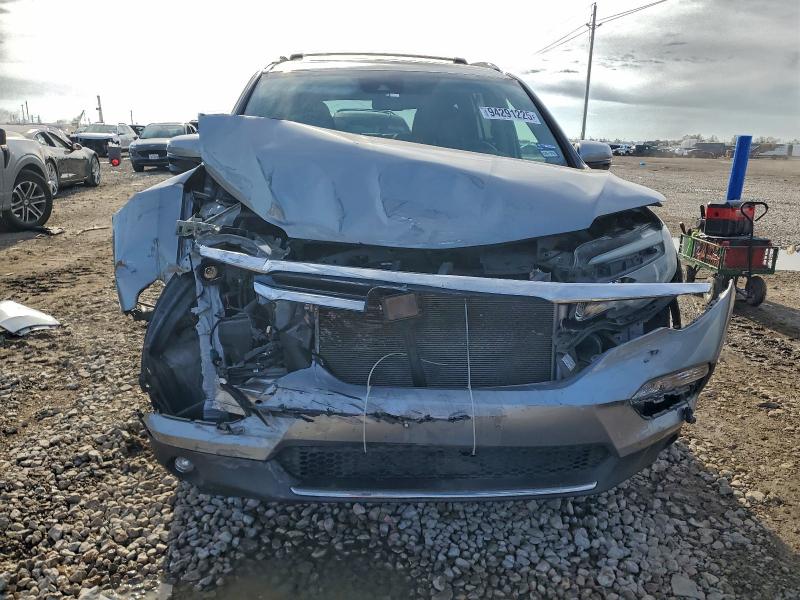Photo 5 from auction – 2016 HONDA PILOT TOUR with VIN 5FNYF5H95GB045982