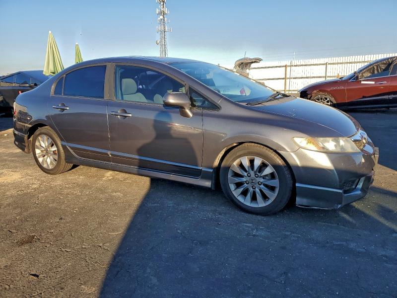 Photo 4 from auction – 2010 HONDA CIVIC EX with VIN 19XFA1F85AE072931