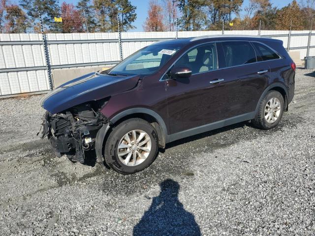 KIA SORENTO LX 2016 with VIN 5XYPG4A35GG038080 - Photo from auction