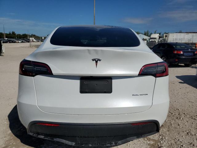 Photo 6 from auction – 2023 TESLA MODEL Y with VIN 7SAYGDEE4PA025098