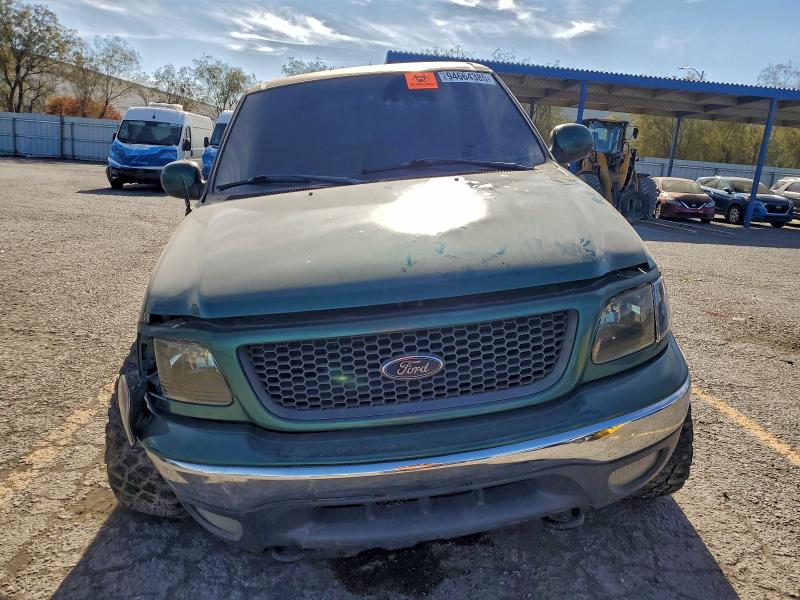 Photo 5 from auction – 2000 FORD F150 with VIN 2FTRX18L7YCA32861