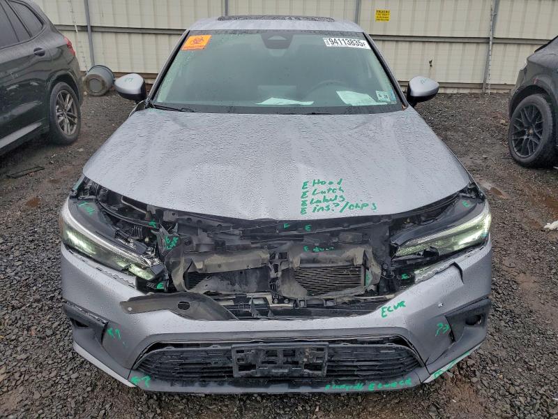 Photo 5 from auction – 2023 HONDA CIVIC with VIN 2HGFE1F77PH301359