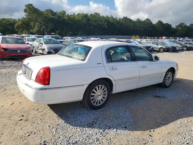 Photo 3 from auction – 2003 LINCOLN TOWN CAR E with VIN 1LNHM81WX3Y627945