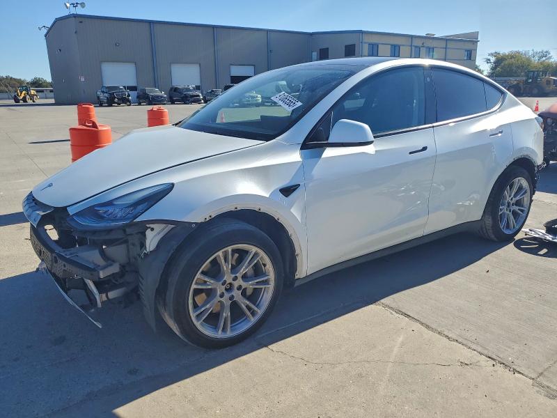 TESLA MODEL Y 2022 with VIN 7SAYGDEE6NA012883 - Photo from auction