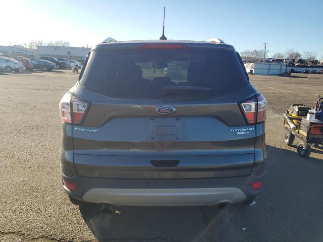 Photo 6 from auction – 2018 FORD ESCAPE TIT with VIN 1FMCU9J94JUC84211