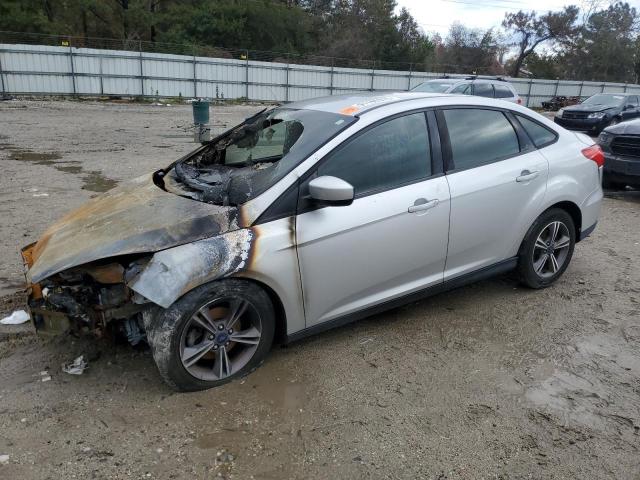FORD FOCUS SE 2018 with VIN 1FADP3FE9JL208840 - Photo from auction