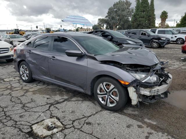 Photo 4 from auction – 2017 HONDA CIVIC LX with VIN 19XFC2F56HE048671