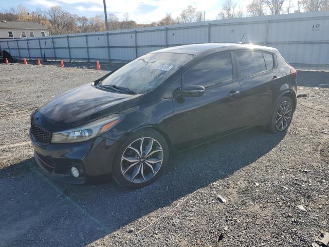 KIA FORTE EX 2017 with VIN 3KPFN5A35HE150884 - Photo from auction