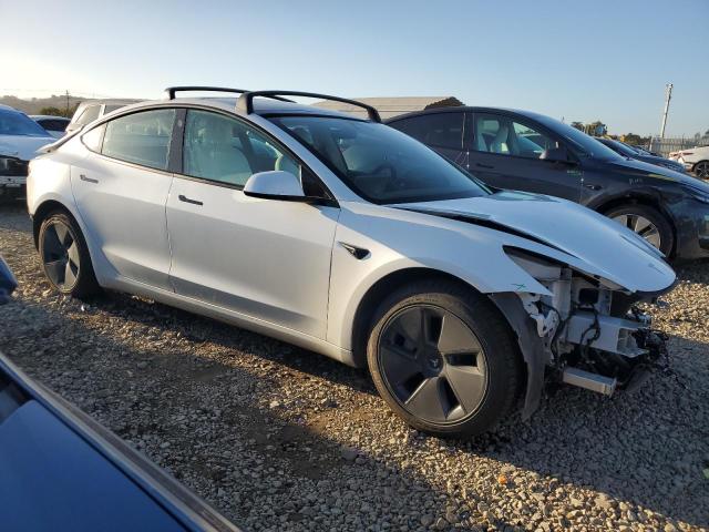 Photo 4 from auction – 2021 TESLA MODEL 3 with VIN 5YJ3E1EB6MF876142
