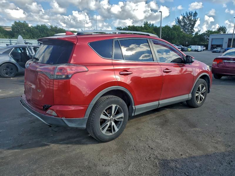 Photo 3 from auction – 2016 TOYOTA RAV4 XLE with VIN 2T3WFREV2GW255336