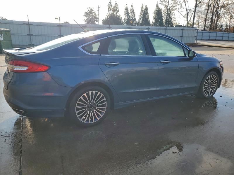 Photo 3 from auction – 2018 FORD FUSION TIT with VIN 3FA6P0D96JR193941
