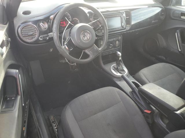 Photo 8 from auction – 2014 VOLKSWAGEN BEETLE with VIN 3VWFP7AT2EM611060