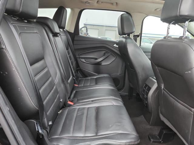 Photo 11 from auction – 2017 FORD ESCAPE SE with VIN 1FMCU9GD2HUD01917