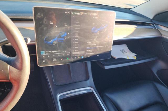 Photo 9 from auction – 2023 TESLA MODEL 3 with VIN 5YJ3E1EA4PF493005