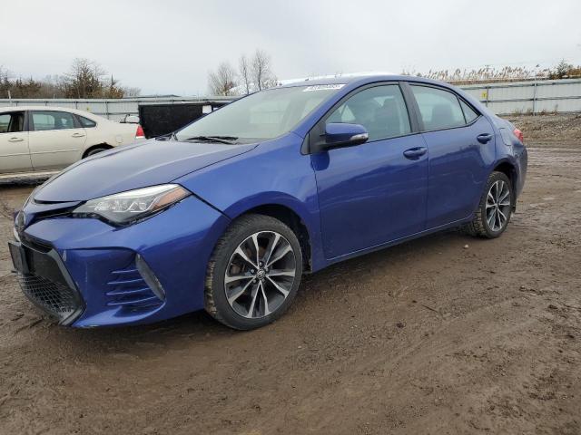 TOYOTA COROLLA L 2018 with VIN 2T1BURHE2JC023692 - Photo from auction