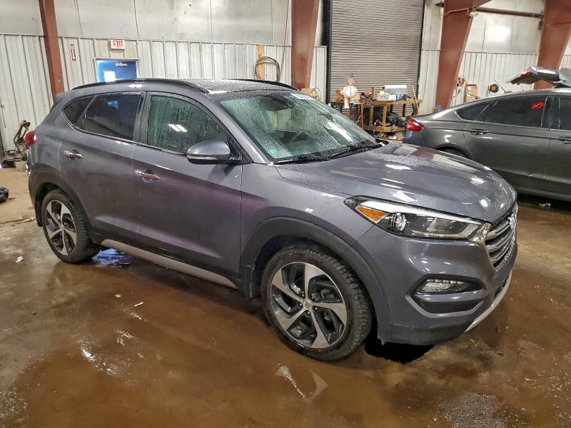 Photo 4 from auction – 2017 HYUNDAI TUCSON LIM with VIN KM8J3CA23HU278730