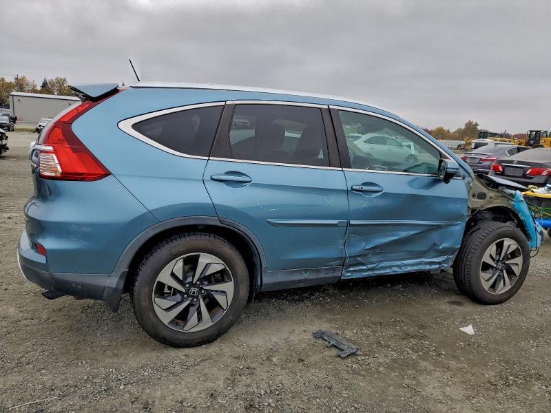 Photo 3 from auction – 2015 HONDA CR-V with VIN 5J6RM4H96FL047590