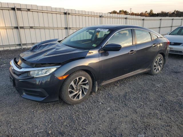 HONDA CIVIC EX 2017 with VIN 19XFC2F78HE065635 - Photo from auction