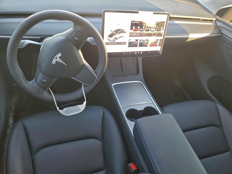 Photo 8 from auction – 2023 TESLA MODEL Y with VIN 7SAYGDEE1PA143450
