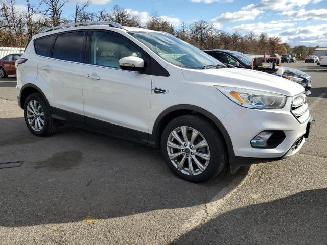 Photo 4 from auction – 2017 FORD ESCAPE TIT with VIN 1FMCU9J97HUE18414