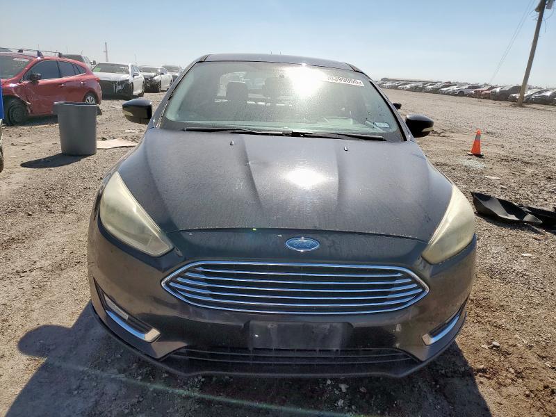 Photo 5 from auction – 2015 FORD FOCUS TITA with VIN 1FADP3J26FL261127