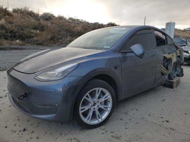 TESLA MODEL Y 2023 with VIN 7SAYGDEE5PF747229 - Photo from auction