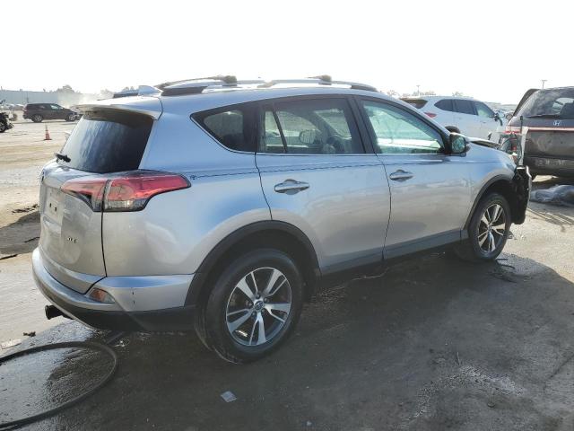 Photo 3 from auction – 2017 TOYOTA RAV4 XLE with VIN 2T3WFREV0HW384502