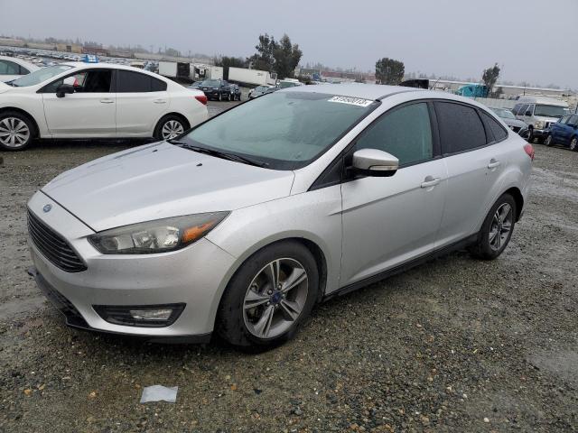 FORD FOCUS SE 2017 with VIN 1FADP3FE0HL285199 - Photo from auction