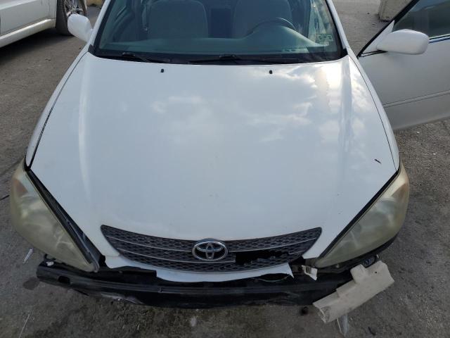 Photo 11 from auction – 2003 TOYOTA CAMRY LE with VIN 4T1BE32K83U223146