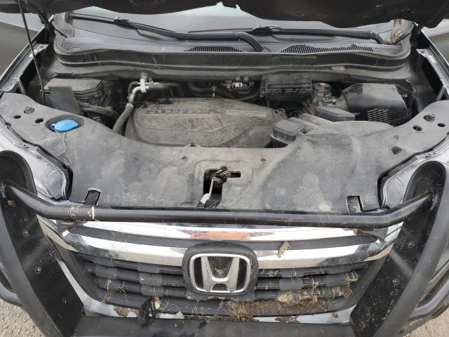 Photo 11 from auction – 2017 HONDA RIDGELINE with VIN 5FPYK2F56HB008040