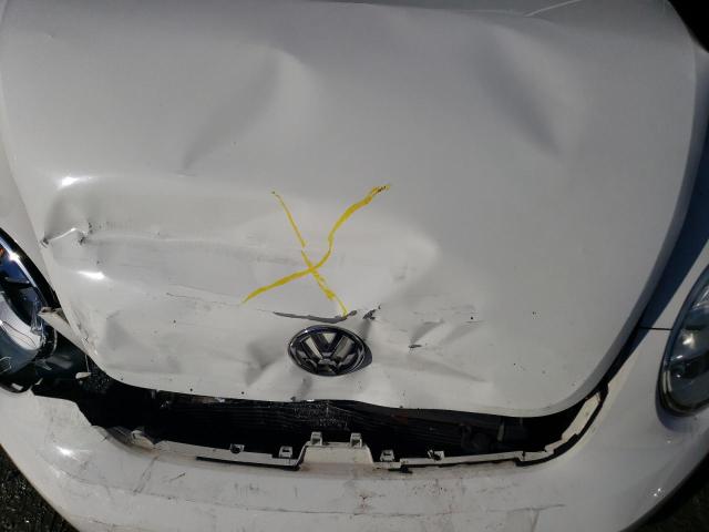 Photo 11 from auction – 2013 VOLKSWAGEN BEETLE with VIN 3VW5P7AT5DM818357