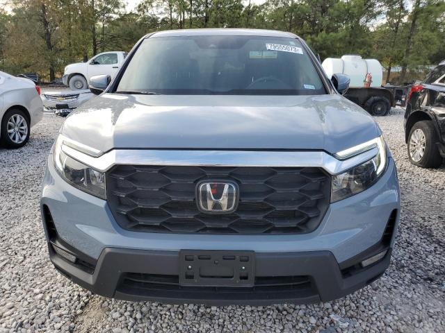 Photo 5 from auction – 2023 HONDA PASSPORT E with VIN 5FNYF8H56PB001021