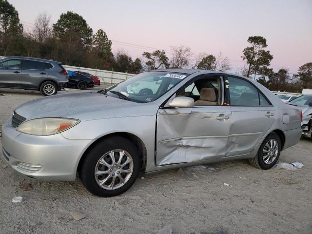 TOYOTA CAMRY LE 2002 with VIN 4T1BE32K72U591297 - Photo from auction