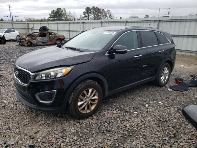 KIA SORENTO LX 2016 with VIN 5XYPG4A56GG095423 - Photo from auction