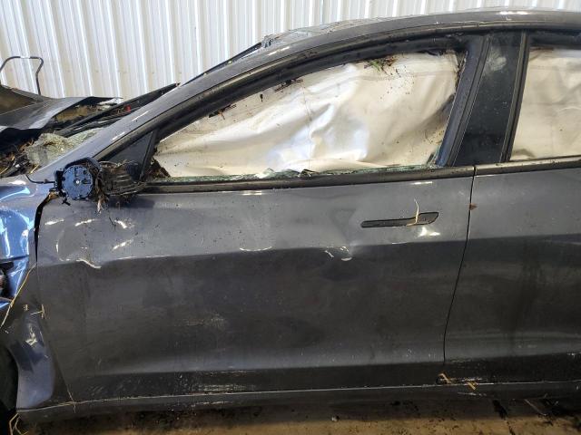 Photo 7 from auction – 2021 TESLA MODEL 3 with VIN 5YJ3E1EBXMF990466