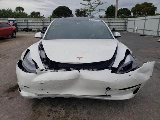 Photo 5 from auction – 2021 TESLA MODEL 3 with VIN 5YJ3E1EA3MF085252