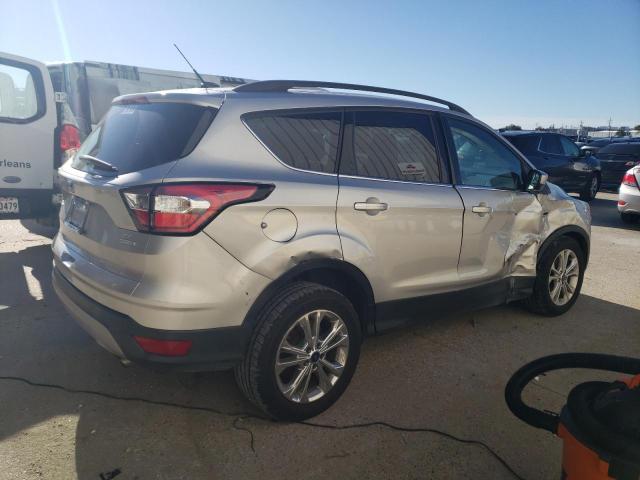 Photo 3 from auction – 2018 FORD ESCAPE SE with VIN 1FMCU0GD0JUC10954