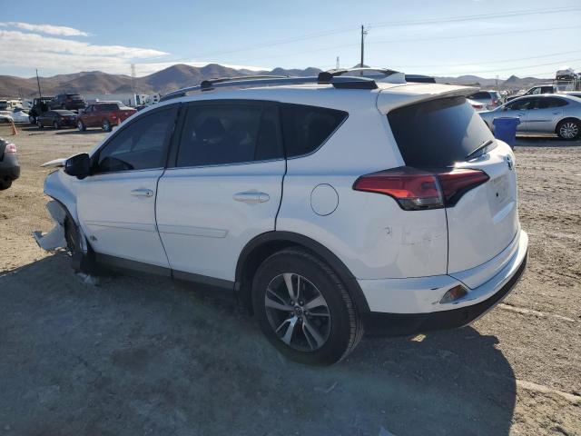 Photo 2 from auction – 2017 TOYOTA RAV4 XLE with VIN 2T3WFREV7HW344403