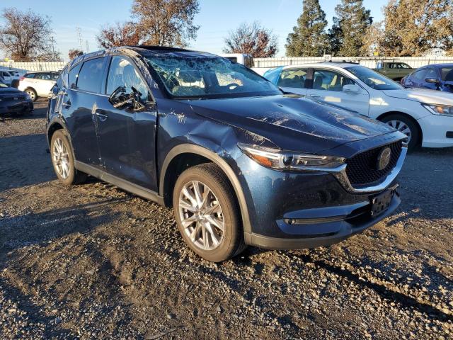 Photo 4 from auction – 2021 MAZDA CX-5 GRAND with VIN JM3KFBDMXM0492372