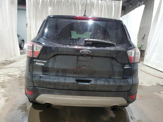 Photo 6 from auction – 2017 FORD ESCAPE SE with VIN 1FMCU9GD3HUC70922