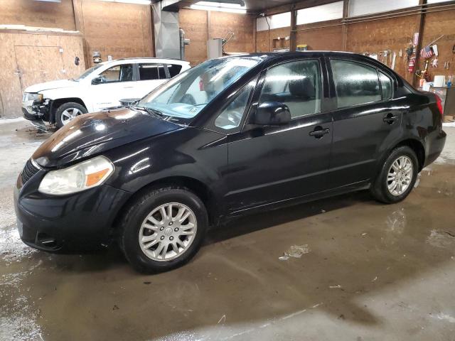 SUZUKI SX4 LE 2012 مع رقم تعريف المركبة JS2YC5A39C6303785 - صورة من المزاد