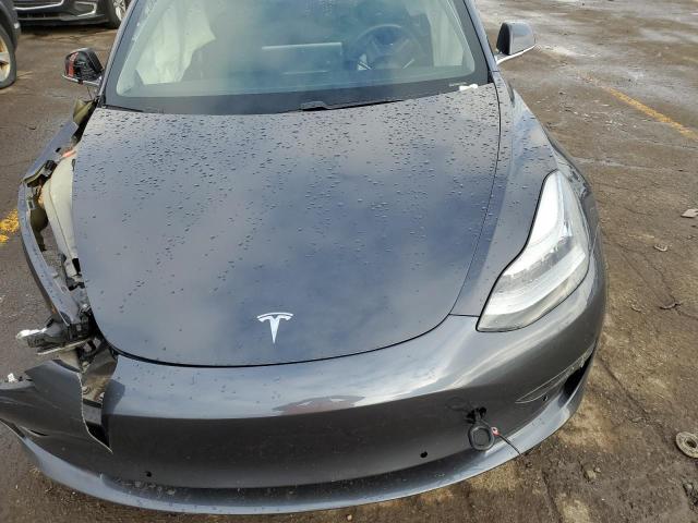 Photo 11 from auction – 2018 TESLA MODEL 3 with VIN 5YJ3E1EB7JF094041