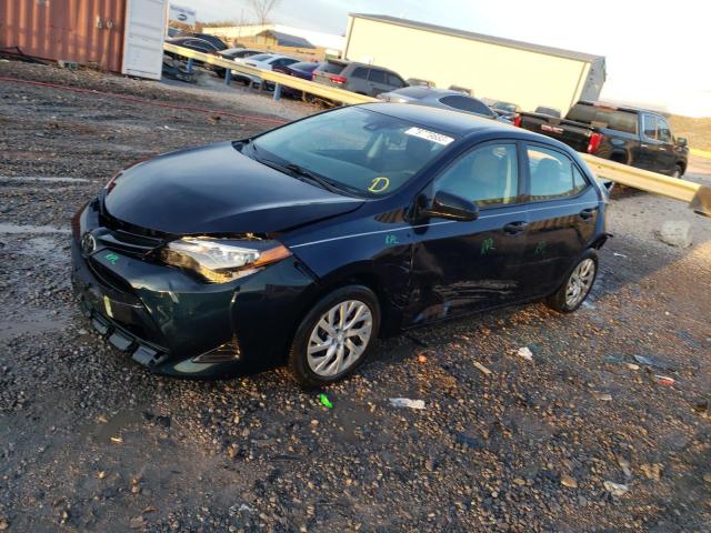 TOYOTA COROLLA L 2019 with VIN 2T1BURHE9KC209411 - Photo from auction