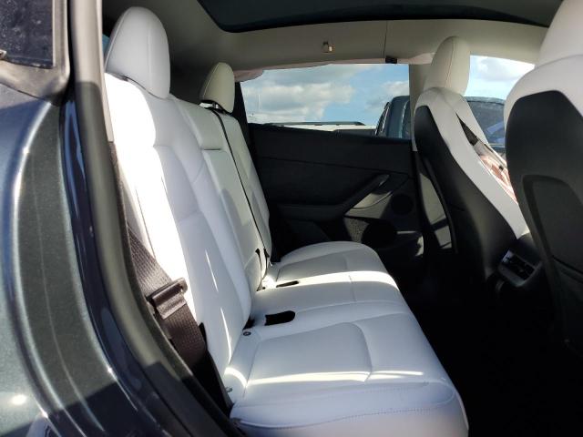 Photo 11 from auction – 2023 TESLA MODEL Y with VIN 7SAYGDEE8PA153943